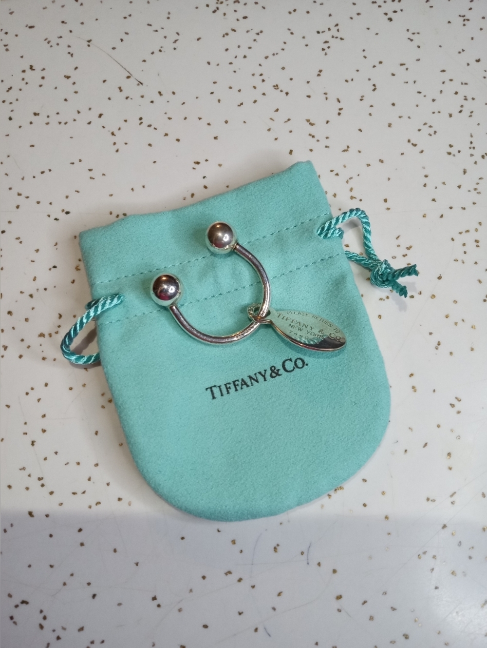 Tiffany & Co. Oval Tag Screwball Key Ring W/ Pouch